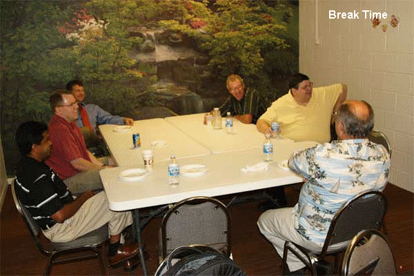 Elders of the Covenant Reformed Presbyterian Church sharing hilarity on a seminar  break